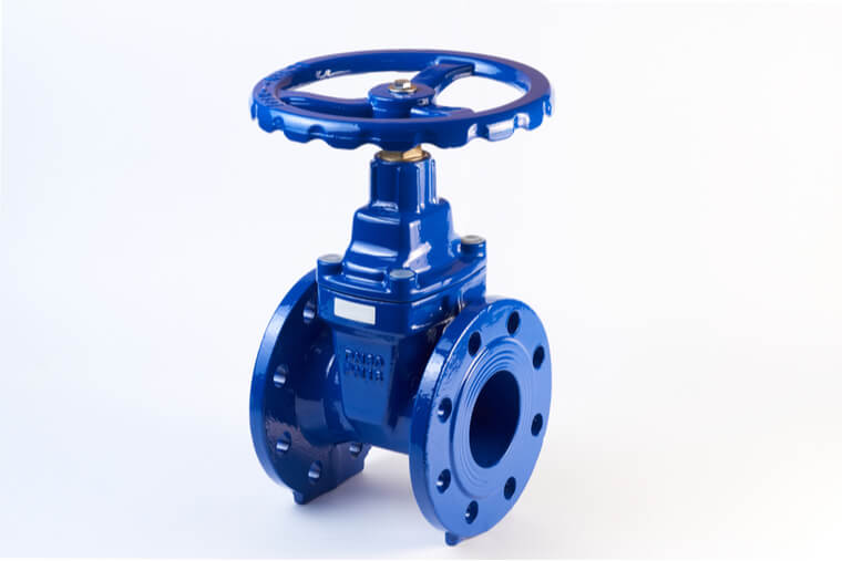 Industrial pipeline wedge gate valve with rubber wedge on a white background. Butterfly valve with reducer isolated on white background. Manual valve