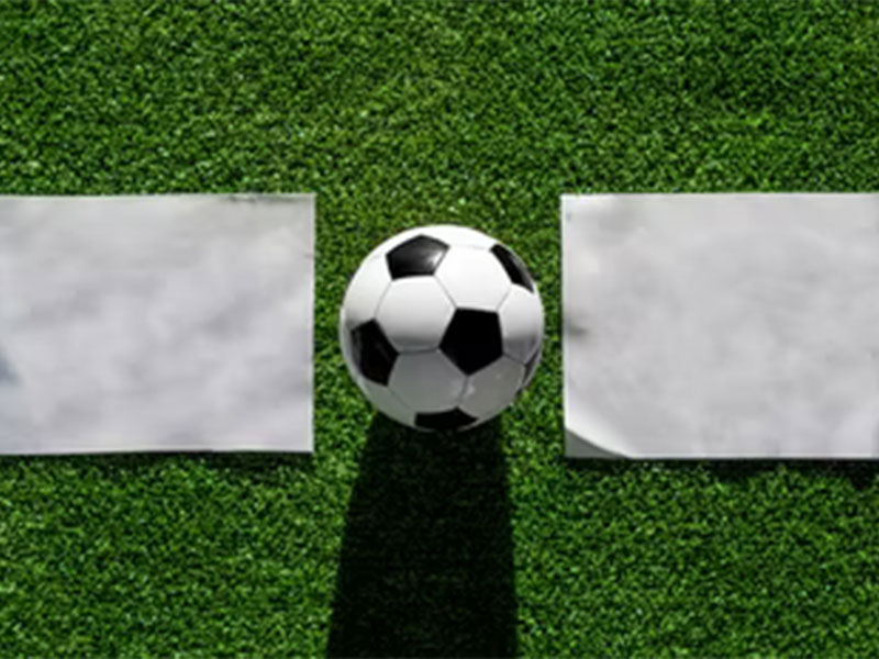 White-Soccer-Ball-on-Green-Grass